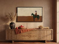 Cowboy on Horseback Wide Wall Art — Original Palette-Knife Oil, Oxblood & Olive — original hand-painted oil shown on the wall in a styled room