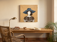 Woman in a Floppy Hat Wall Art — Original Palette-Knife Oil, Ochre & Navy — original hand-painted oil shown on the wall in a styled room