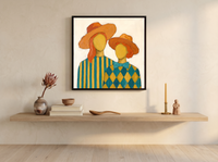 Two Ladies in Orange Hats Wall Art — Original Palette-Knife Oil, Orange & Teal — original hand-painted oil shown on the wall in a styled room