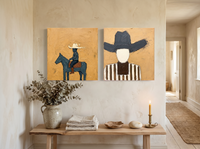 Rider & Cowboy — Set of 2 Original Oils, Golden Ochre & Slate Blue — original hand-painted oil shown on the wall in a styled room