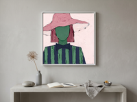 Lady in a Pink Hat Wall Art — Original Palette-Knife Oil, Pink & Navy — original hand-painted oil shown on the wall in a styled room