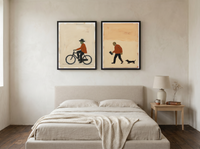 Cyclist & Newspaper Man — Set of 2 Original Oils, Burnt Orange & Cream — original hand-painted oil shown on the wall in a styled room