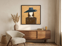 Woman in a Wide Hat Wall Art — Original Palette-Knife Oil, Ochre & Navy — original hand-painted oil shown on the wall in a styled room