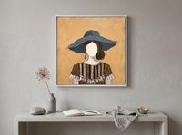 Woman in a Floppy Hat Wall Art — Original Palette-Knife Oil, Ochre & Navy — original hand-painted oil shown on the wall in a styled room