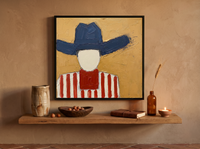 Cowboy in a Wide Hat Wall Art — Original Palette-Knife Oil, Navy & Red — original hand-painted oil shown on the wall in a styled room