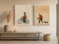 Cyclist & Newspaper Man — Set of 2 Original Oils, Burnt Orange & Cream — original hand-painted oil shown on the wall in a styled room