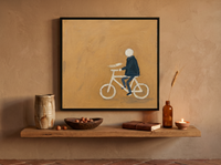 Cyclist Wall Art — Original Palette-Knife Oil, Navy & Ochre — original hand-painted oil shown on the wall in a styled room