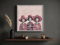 Three Women in Hats Wall Art — Original Palette-Knife Oil, Pink & Navy — original hand-painted oil shown on the wall in a styled room