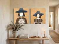 Women in Hats — Set of 2 Original Oils, Slate Blue on Ochre — original hand-painted oil shown on the wall in a styled room