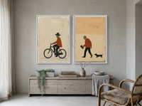 Cyclist & Newspaper Man — Set of 2 Original Oils, Burnt Orange & Cream — original hand-painted oil shown on the wall in a styled room