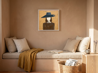 Woman in a Wide Hat Wall Art — Original Palette-Knife Oil, Ochre & Navy — original hand-painted oil shown on the wall in a styled room