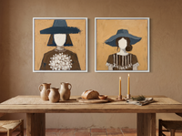 Women in Hats — Set of 2 Original Oils, Slate Blue on Ochre — original hand-painted oil shown on the wall in a styled room