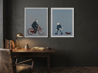 Cyclist & Newspaper Man — Set of 2 Original Oils, Charcoal & Slate — original hand-painted oil shown on the wall in a styled room