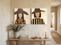 Two Women in Floppy Hats — Set of 2 Original Oils, Chocolate & Gold — original hand-painted oil shown on the wall in a styled room