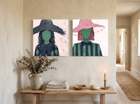 Two Women in Floppy Hats — Set of 2 Original Oils, Charcoal & Emerald — original hand-painted oil shown on the wall in a styled room