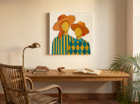 Two Ladies in Orange Hats Wall Art — Original Palette-Knife Oil, Orange & Teal — original hand-painted oil shown on the wall in a styled room