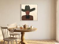 Cowboy in a Wide Hat Wall Art — Original Palette-Knife Oil, Charcoal & Oxblood — original hand-painted oil shown on the wall in a styled room
