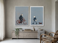 Cyclist & Newspaper Man — Set of 2 Original Oils, Charcoal & Slate — original hand-painted oil shown on the wall in a styled room