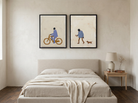 Cyclist & Newspaper Man — Set of 2 Original Oils, Periwinkle & Oat — original hand-painted oil shown on the wall in a styled room