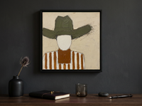 Cowboy in a Wide Hat Wall Art — Original Palette-Knife Oil, Olive & Rust — original hand-painted oil shown on the wall in a styled room