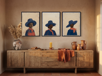 Three Women in Hats Triptych — 3 Original Oils, Indigo & Coral — original hand-painted oil shown on the wall in a styled room