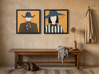 Cowboy & Wide-Brim Lady — Set of 2 Original Oils, Ochre & Slate Blue — original hand-painted oil shown on the wall in a styled room