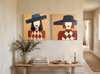 Red-Lipped Woman in a Wide Hat — Set of 2 Original Oils, Navy & Vermilion — original hand-painted oil shown on the wall in a styled room