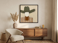 Cowboy in a Wide Hat Wall Art — Original Palette-Knife Oil, Olive & Rust — original hand-painted oil shown on the wall in a styled room