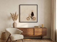 Cyclist Wall Art — Original Palette-Knife Oil, Black & Ochre — original hand-painted oil shown on the wall in a styled room