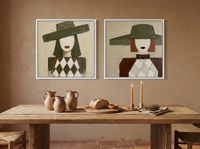 Red-Lipped Woman in a Wide Hat — Set of 2 Original Oils, Olive & Sienna — original hand-painted oil shown on the wall in a styled room
