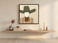 Cowboy in a Wide Hat Wall Art — Original Palette-Knife Oil, Olive & Rust — original hand-painted oil shown on the wall in a styled room