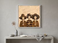 Three Women in Hats Wall Art — Original Palette-Knife Oil, Chocolate & Tan — original hand-painted oil shown on the wall in a styled room