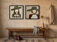 Red-Lipped Woman in a Wide Hat — Set of 2 Original Oils, Olive & Sienna — original hand-painted oil shown on the wall in a styled room