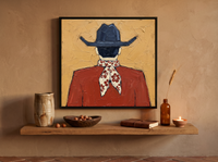 Cowboy from Behind Wall Art — Original Palette-Knife Oil, Navy & Rust — original hand-painted oil shown on the wall in a styled room
