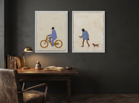 Cyclist & Newspaper Man — Set of 2 Original Oils, Periwinkle & Oat — original hand-painted oil shown on the wall in a styled room