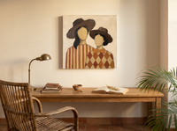 Two Ladies in Wide Hats Wall Art — Original Palette-Knife Oil, Chocolate & Rust — original hand-painted oil shown on the wall in a styled room