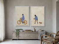 Cyclist & Newspaper Man — Set of 2 Original Oils, Periwinkle & Oat — original hand-painted oil shown on the wall in a styled room