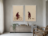 Cyclist & Newspaper Man — Set of 2 Original Oils, Wine & Oat — original hand-painted oil shown on the wall in a styled room