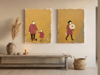Father & Child with Woman & Bouquet — Set of 2 Original Oils, Mustard & Rose — original hand-painted oil shown on the wall in a styled room