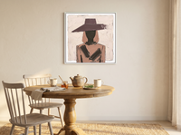Woman in a Wide Hat Wall Art — Original Palette-Knife Oil, Mauve & Charcoal — original hand-painted oil shown on the wall in a styled room