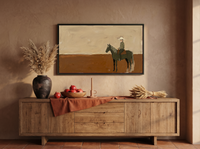 Cowboy on Horseback Wide Wall Art — Original Palette-Knife Oil, Olive & Burnt Sienna — original hand-painted oil shown on the wall in a styled room