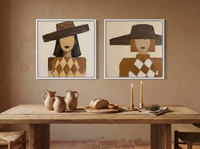 Red-Lipped Woman in a Wide Hat — Set of 2 Original Oils, Chocolate & Cream — original hand-painted oil shown on the wall in a styled room